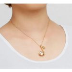 Náhrdelník s príveskom s notami, zdobený kryštálmi Swarovski