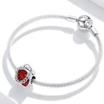 Strieborné kúzlo, nitkový kríž