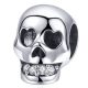 Strieborné kúzlo, lebka