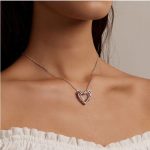 Strieborný náhrdelník s príveskom s dvojitým srdcom a motýľom