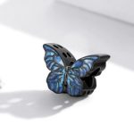 Strieborné kúzlo, tmavomodrý motýľ