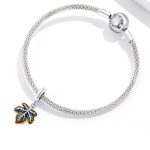 Strieborné kúzlo, drevený list