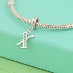 Strieborný prívesok, písmeno X