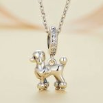 Ezüst charm, uszkár