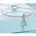 Strieborné kúzlo, srdce s hviezdou