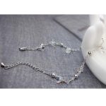 Kamenný náramok v tvare perly, zdobený kryštálmi Swarovski