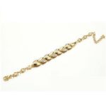 Náramok s listami, zdobený kryštálmi, v zlatej farbe