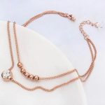 Dvojitý nánožník zdobený kryštálmi Swarovski