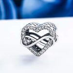 Ezüst charm, szív a végtelen jelével