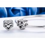 Ezüst charm, szív a végtelen jelével