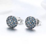 Strieborné náušnice s vlnkovým vzorom, modrý kryštál