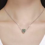 Ezüst charm, szív madárral