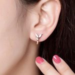 Strieborné náušnice, delfínsky chvost, ružové zlato