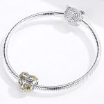 Strieborné kúzlo, prepichnuté srdce