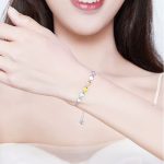 Ezüst karkötő színes szívekkel