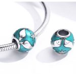 Strieborné kúzlo s delfínmi