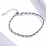 Ezüst karkötő zsinórral, fekete