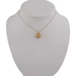 Prívesok zo 14 kt zlata, vypuklé srdce, s krížikmi