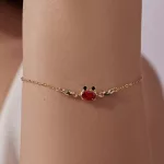 Ezüst női karkötő aranybevonattal