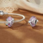 Ezüst charm, gyöngy masnival