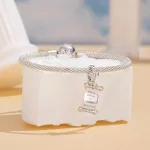 Ezüst charm, papírusztekercs