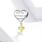 Ezüst charm, szív kereszttel