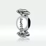 Ezüst charm, cukorka