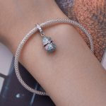 Ezüst charm, szelence