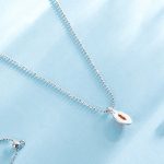 Ezüst női nyaklánc narancsszín medállal