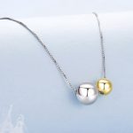 Ezüst nyaklánc aranyozott medállal