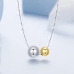 Ezüst nyaklánc aranyozott medállal