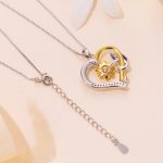 Ezüst női nyaklánc virágos szívmedállal