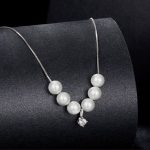 Ezüst nyaklánc gyöngyös medállal