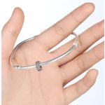 Strieborný prsteňový prívesok, zdobený krištáľovými kamienkami, ružový