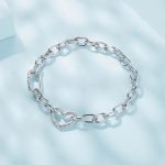 Ezüst alapkarkötő szívmotívummal, 19 cm