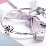Ezüst charm lila kristállyal