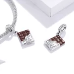 Ezüst charm, csoki