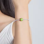 Ezüst charm, teniszlabda