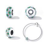 Ezüst charm, lótusz mintával