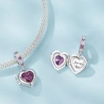 Ezüst charm, kinyitható szív, vörös kristállyal