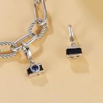 Ezüstcharm, fényképezőgép