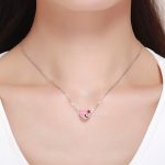 Ezüst charm, szív rózsával