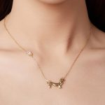 Ezüst nyaklánc tacskómedállal, aranyozott