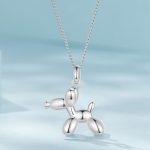 Ezüst női nyaklánc uszkármedállal